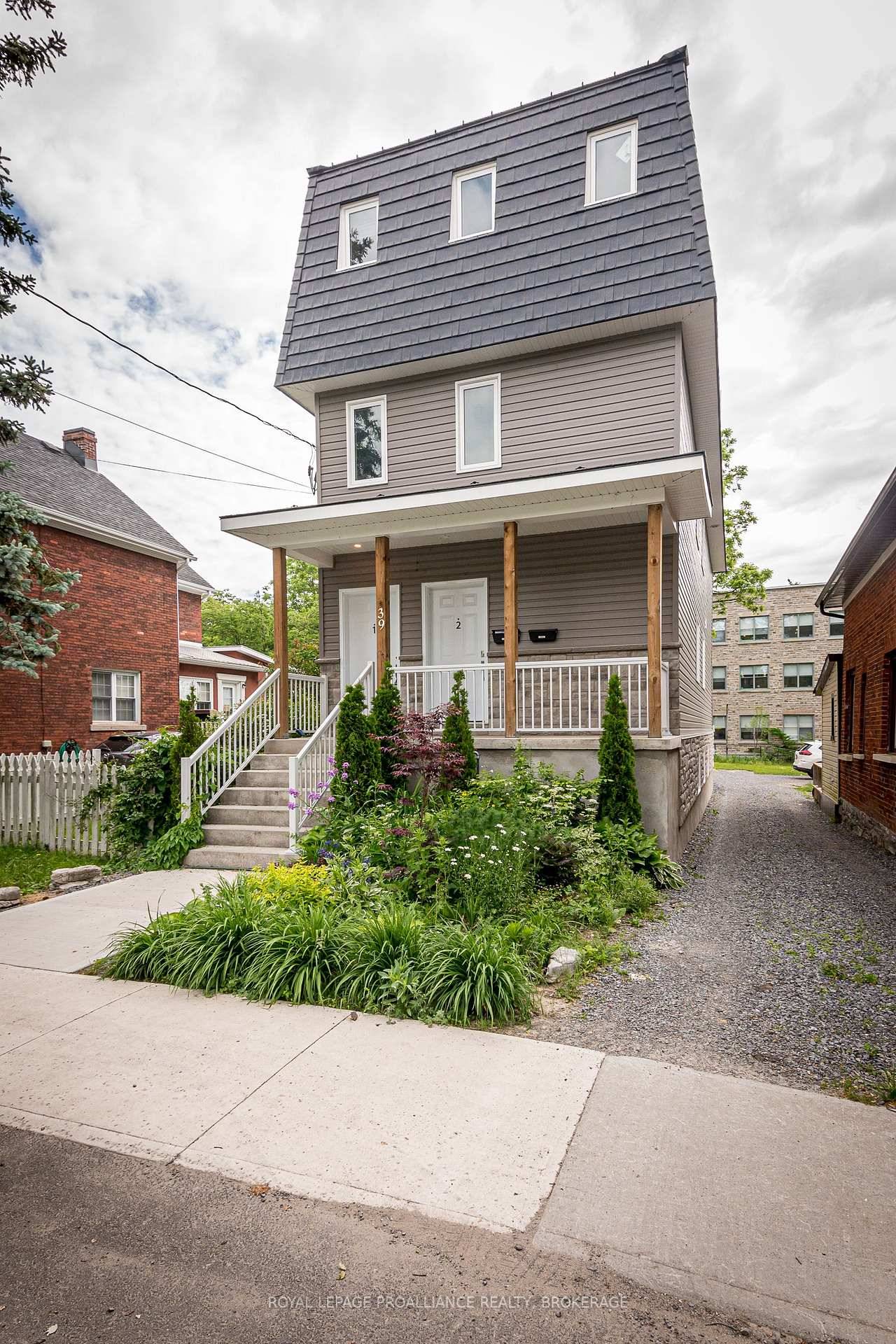 Purpose built in 2022, this 2 unit rental property is ideally located just steps from Queen's University Main Campus and Lake Ontario, with direct backyard access to the Queen's School ...