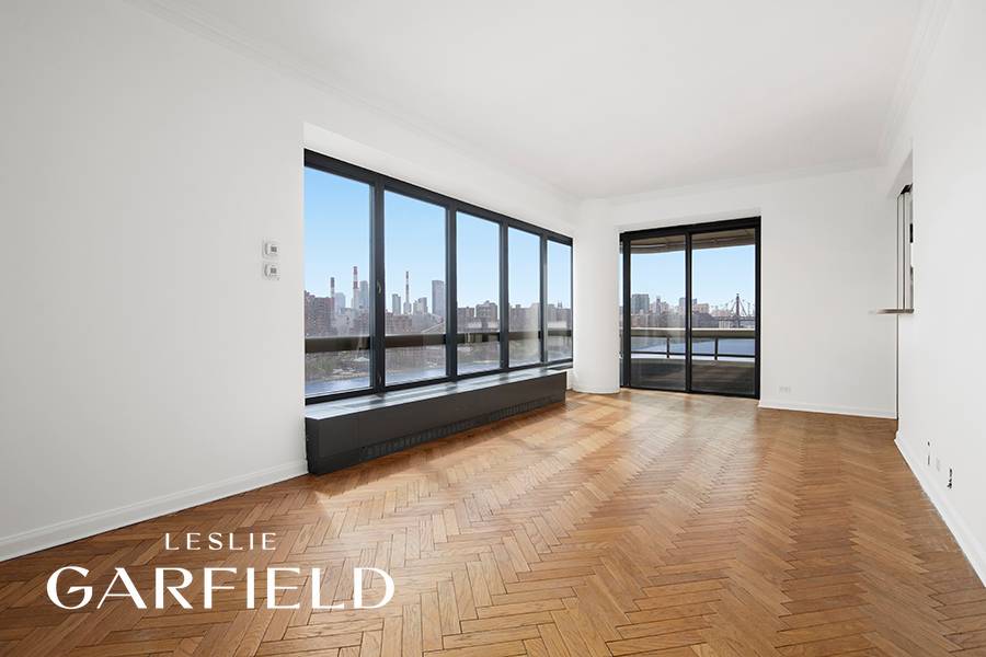 This spacious 2 bedroom, 2 bath corner unit offers stunning riverfront views and abundant natural light with south and east exposures.