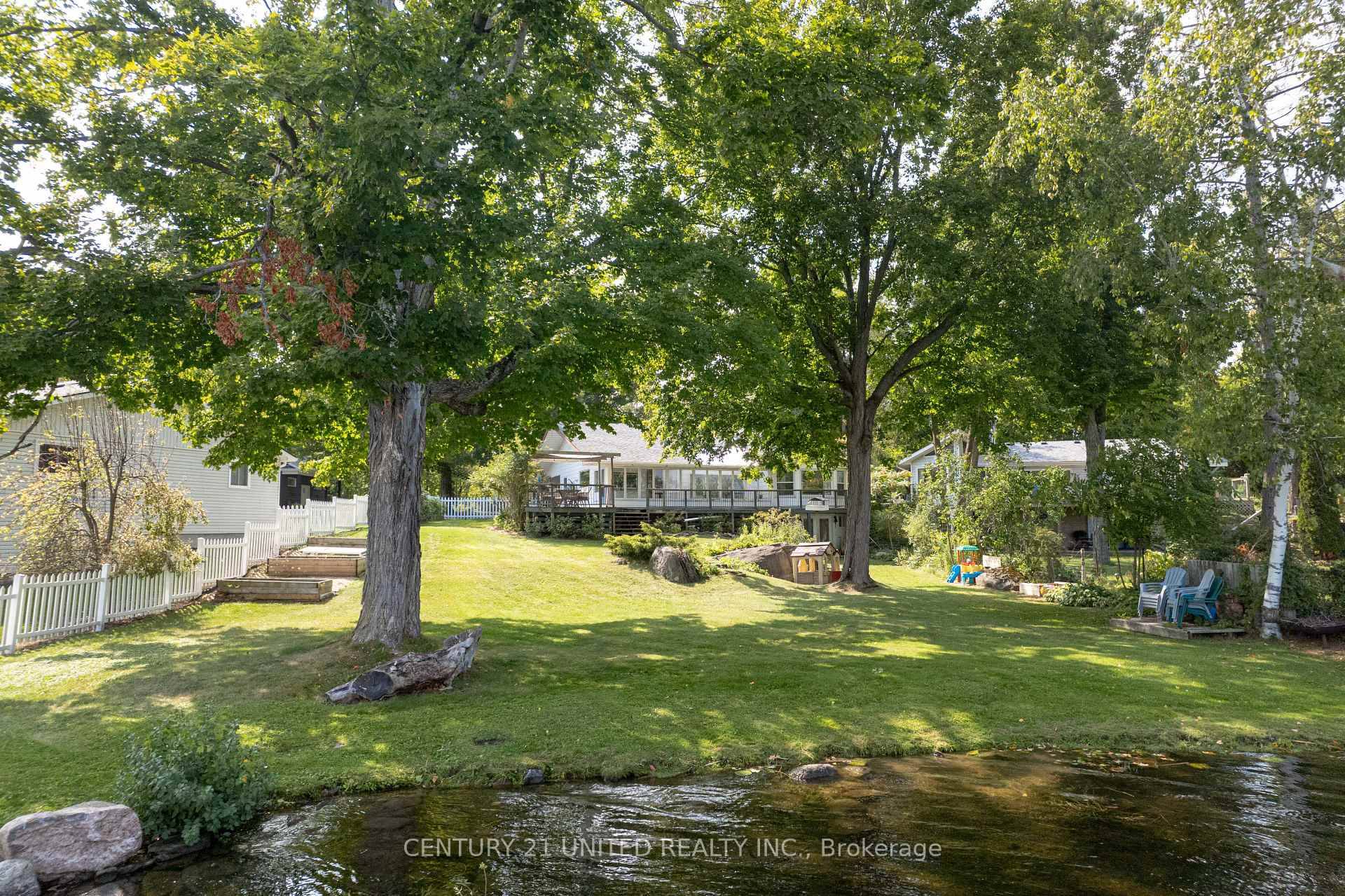2 bedroom walkout bungalow with 80 feet of waterfront on the Otonabee River.