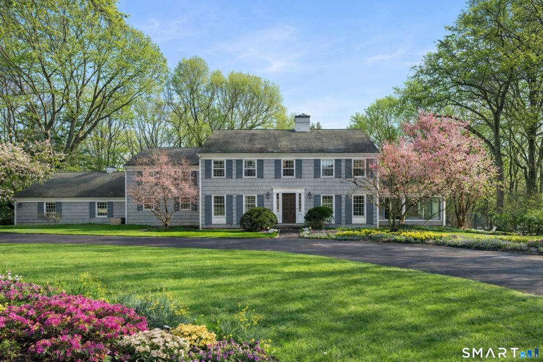Located on a much sought after cul de sac surrounded by estate properties, 77 Winfield Lane presents a compelling opportunity to re envision a 4, 100 square foot, 5 bedroom, ...