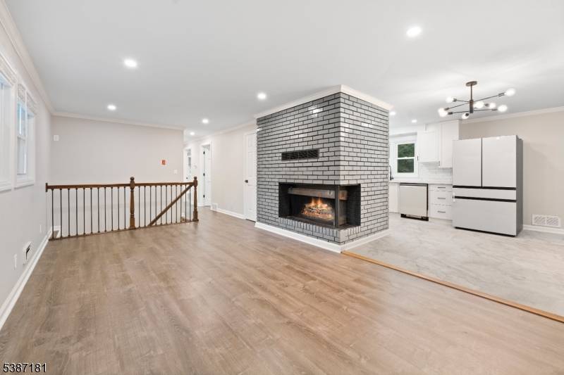 Welcome to this updated ranch on a mature, tree lined street with a fully finished walkout basement with the secondary kitchenette.