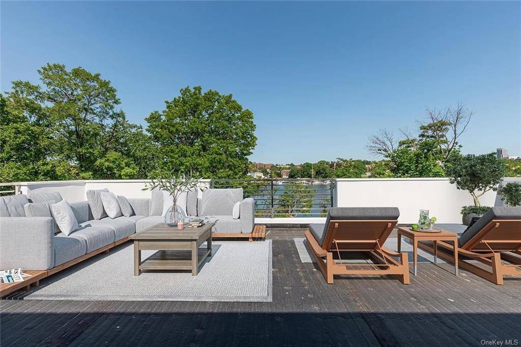 Enjoy stunning panoramic water views in this pristine move in condition Contemporary home in Davenport Mansion.