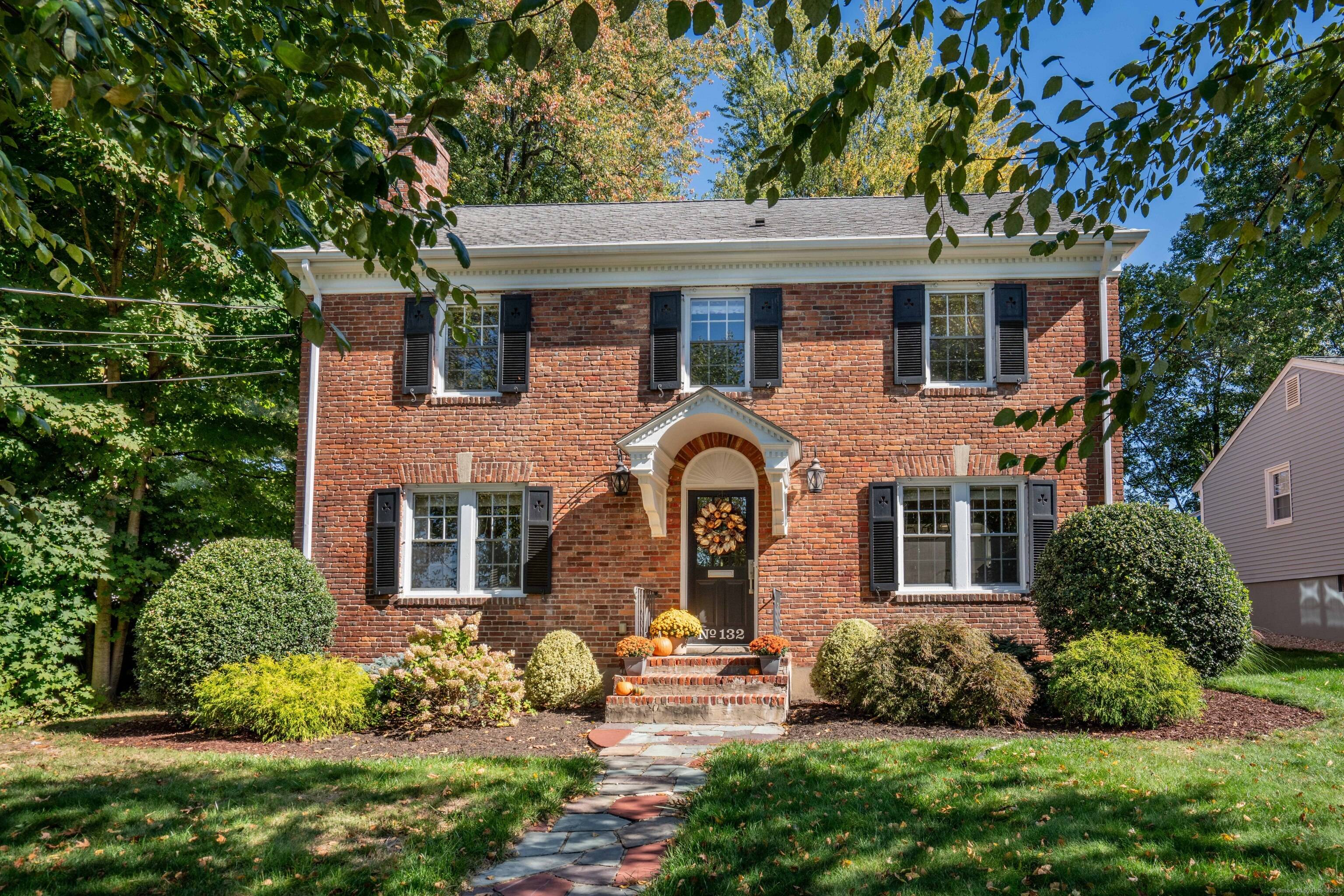 Perfectly situated in an amazing location, this 2656 square foot Brick Colonial may just check all of your boxes !