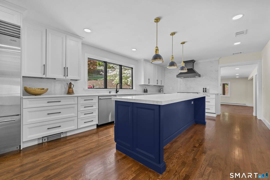 This fully reimagined Westover 4 bedroom luxury home offers turnkey living with high end design and exceptional natural light just minutes from downtown Stamford.