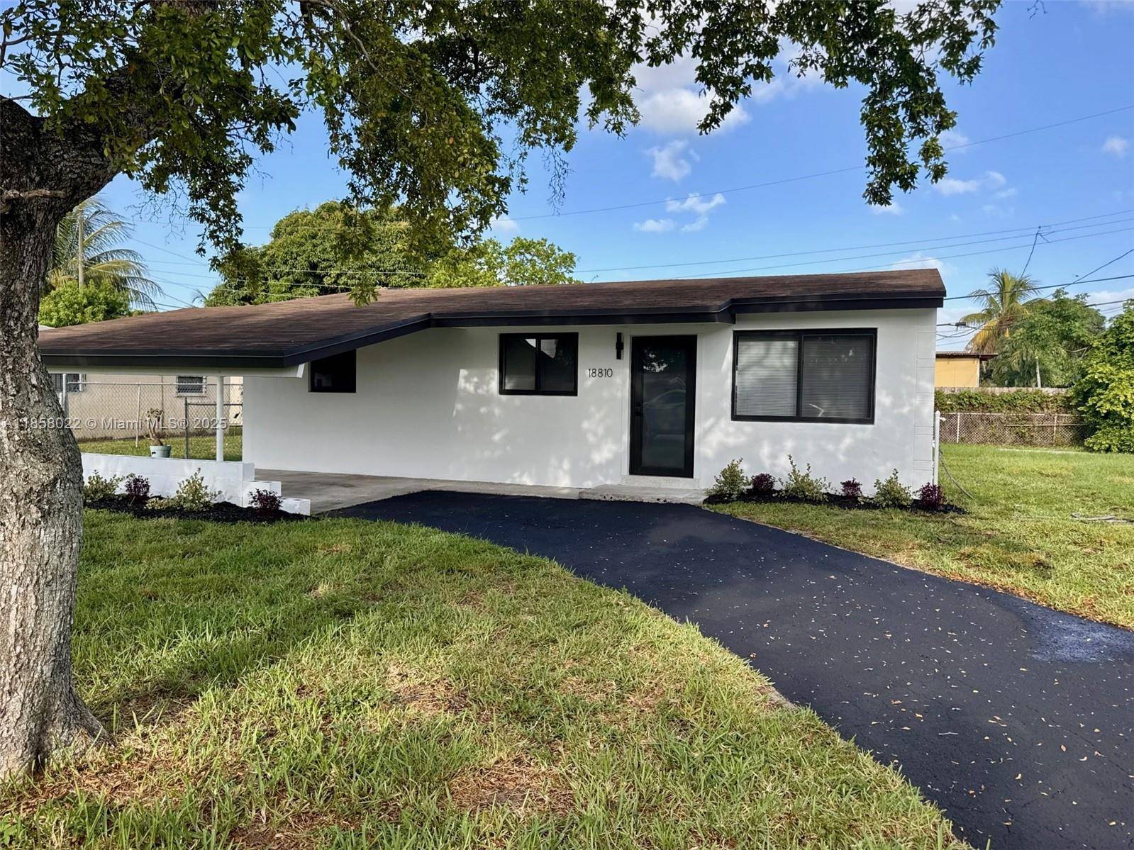Move in ready and beautifully updated, this charming home features new impact windows, a 2018 roof, and a modern kitchen with stylish finishes.