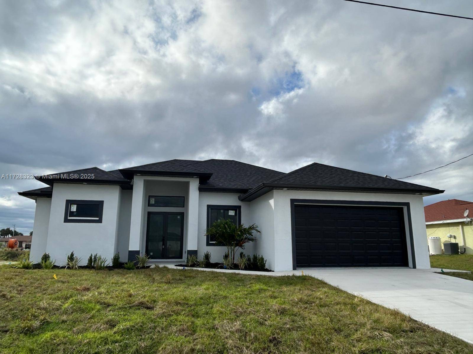 Welcome to a breathtaking new construction single family home nestled in the heart of Cape Coral, Florida.