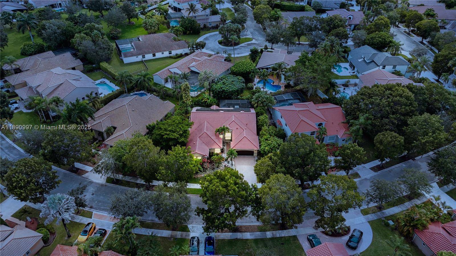 Beautifully updated one story home located in the gated community of The Lakes in Weston.