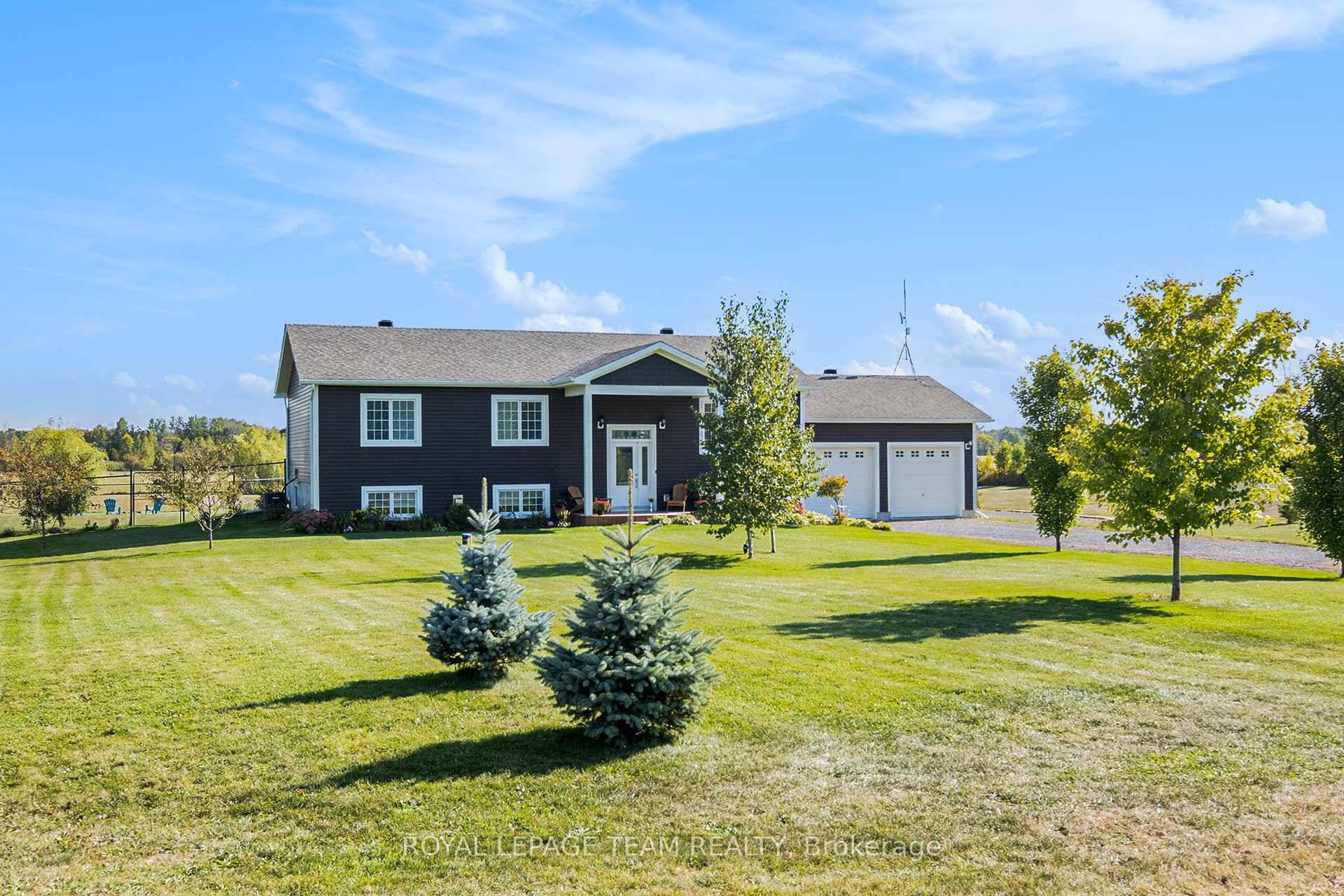 Welcome to perfect blend of peaceful rural living and modern style on a serene 1.