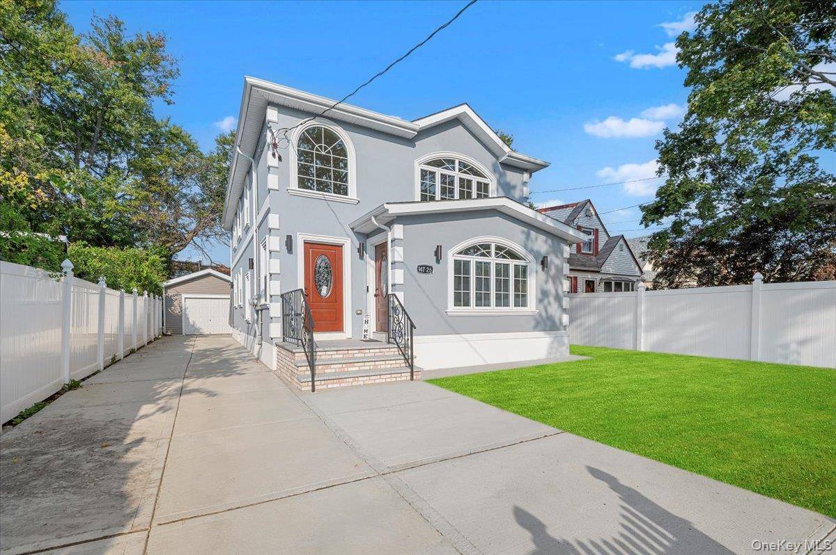 Welcome to this stunning fully renovated two family house, where modern elegance meets exceptional functionality.