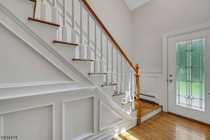Set away from the road on a sunny, gently rolling hill, this beautifully maintained 4Br, 3.