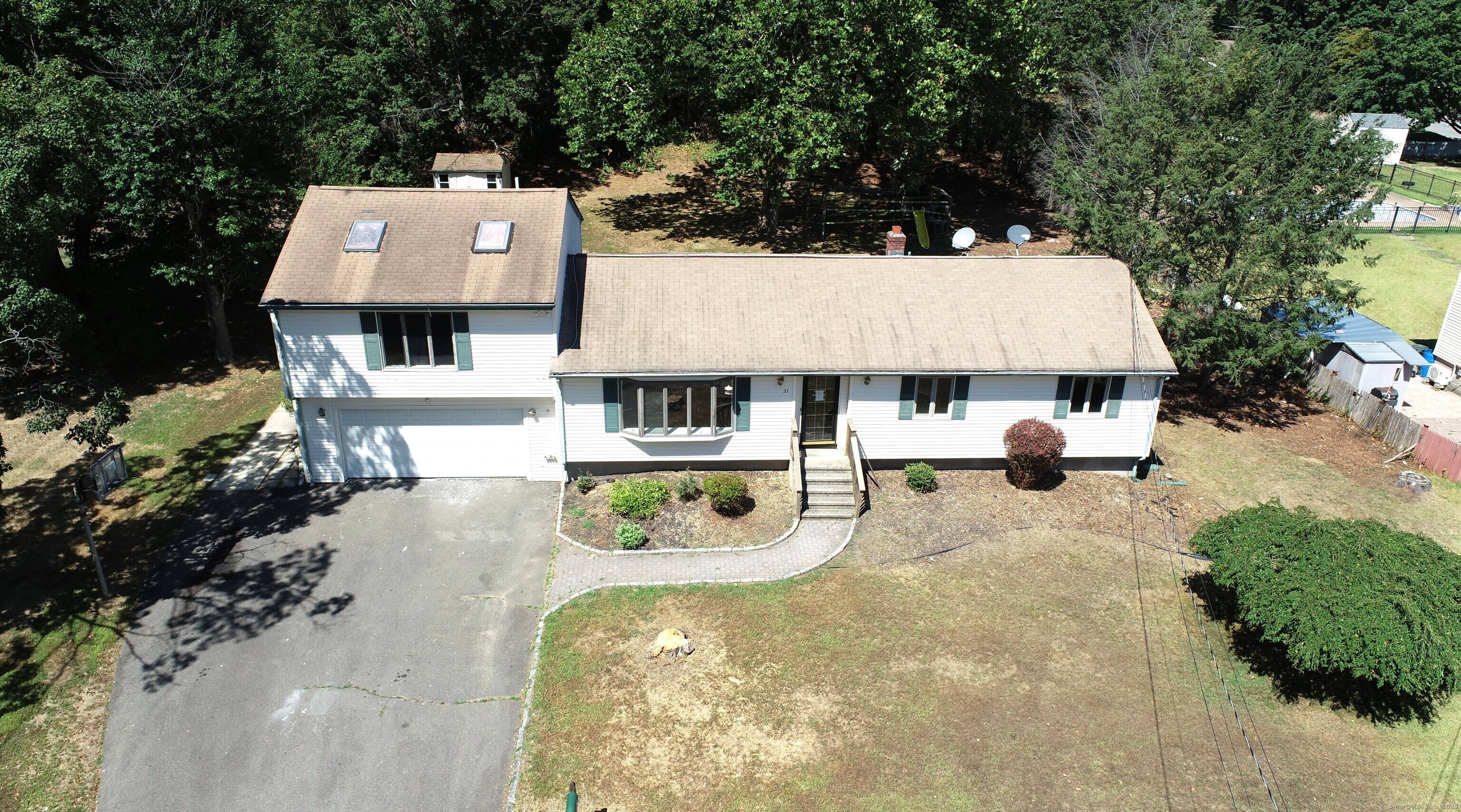Expanded Ranch on Cul de Sac Road.