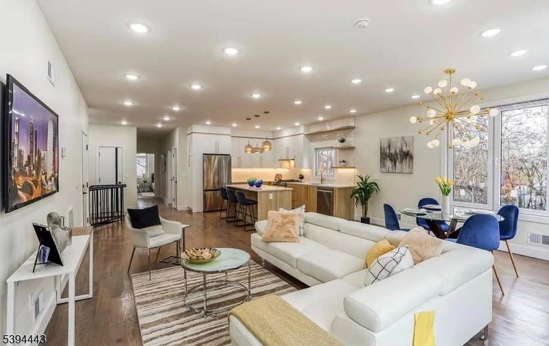 SHOW STOPPER ! ! Sensational CUSTOM NEW CONSTRUCTION 1st floor and ground floor rental duplex.