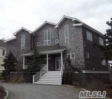A Fabulous Ocean Front Home Located in Westhampton Dunes.