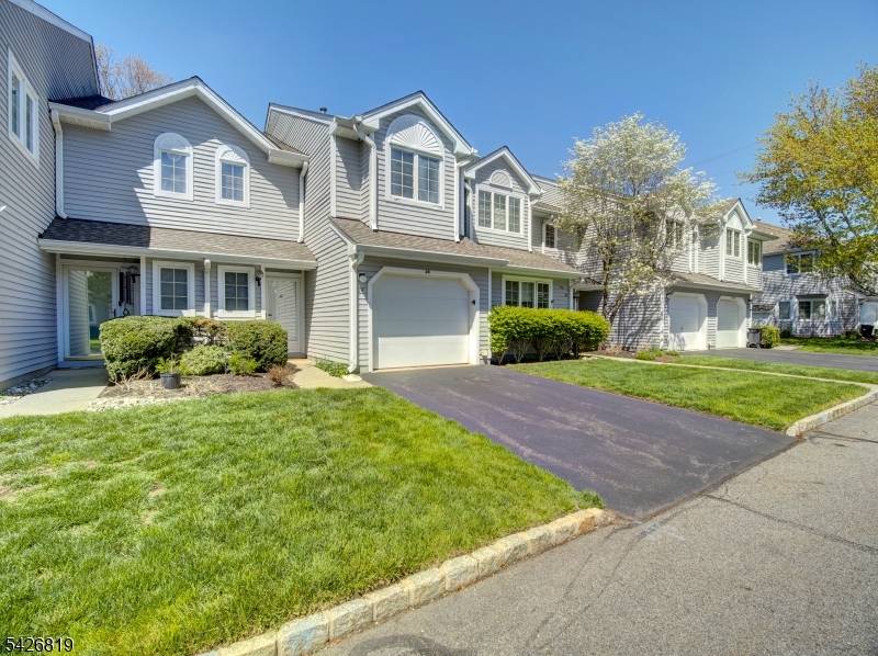 This two bedroom Aberdeen model townhome is located in the premier community of Montville Chase, offering an exceptional lifestyle with a wide range of amenities, including a renovated pool, tennis ...