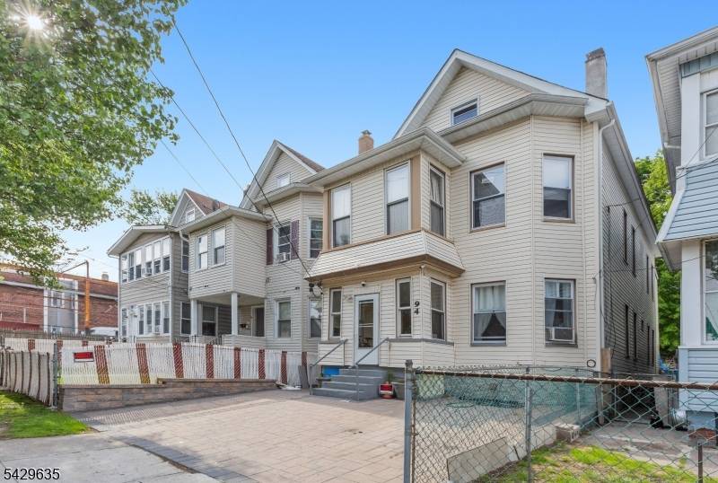 2 Family located in the heart of city Passaic This meticulously well maintained home is waiting for a perfect buyer.
