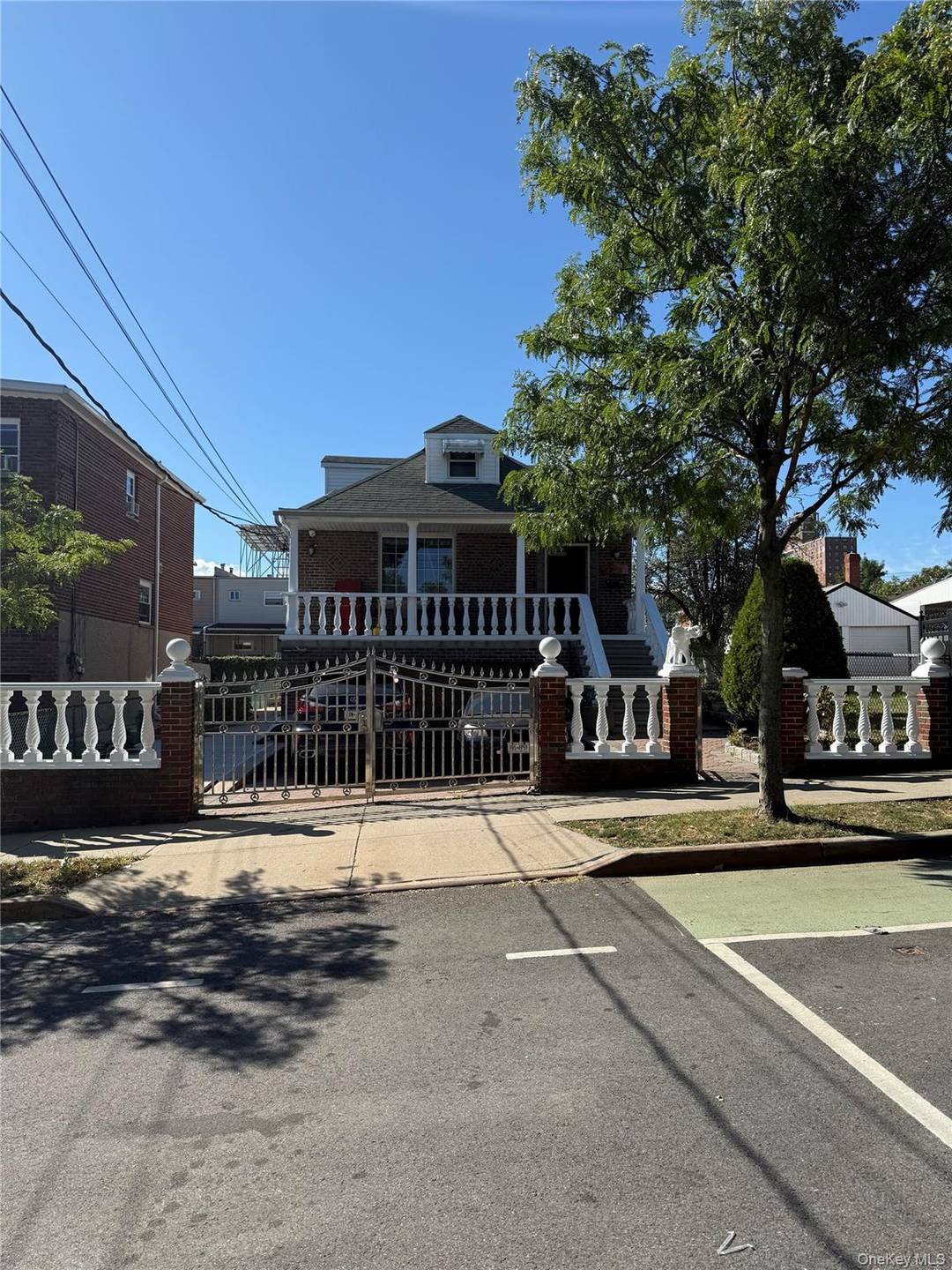 Welcome to this beautifully maintained one family home used as a two family.