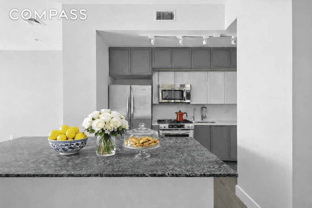 Zen Garden Duplex 2BR Flexible Third Suite 3BA Direct Amenity Access Prime Midtown West A rare garden facing duplex residence at 416 West 52nd Street, TH205, offering exceptional scale, privacy, ...