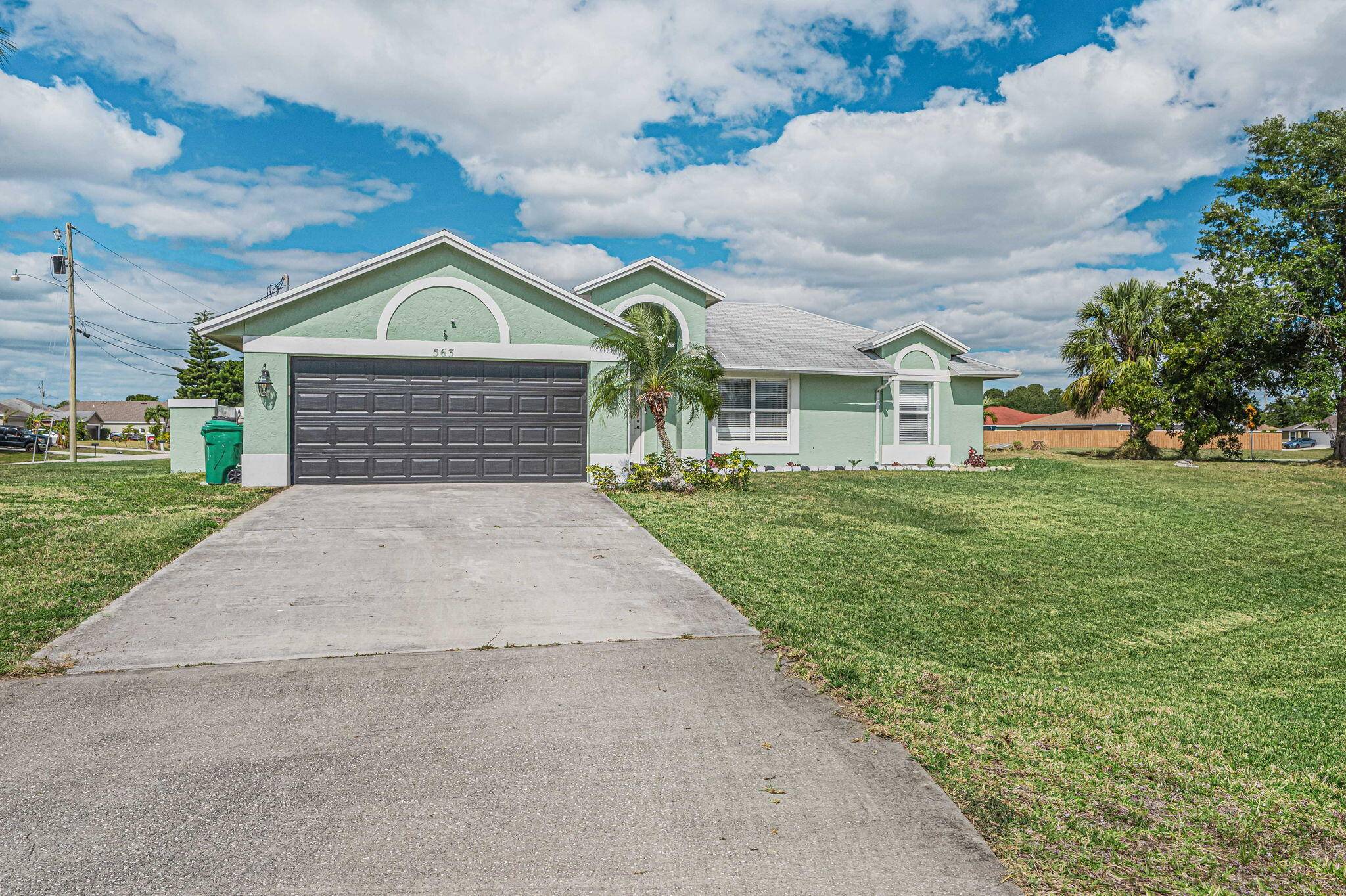A rare opportunity to own a home on a spacious corner lot that sits all by itself.