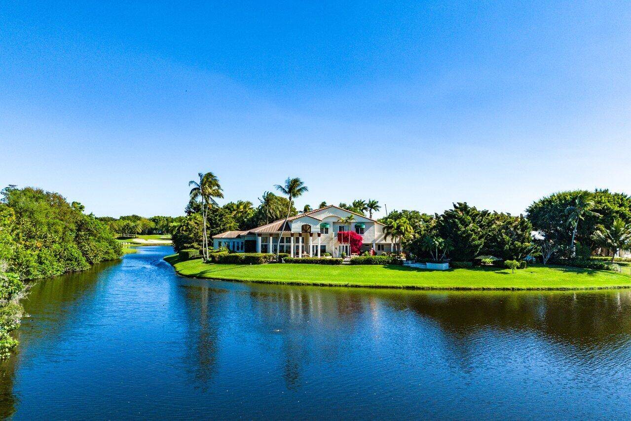 Build new or renovate this over 7, 000 sq foot one story home that sits on just shy of an acre on an extraordinary, expansive, pie shaped lot.