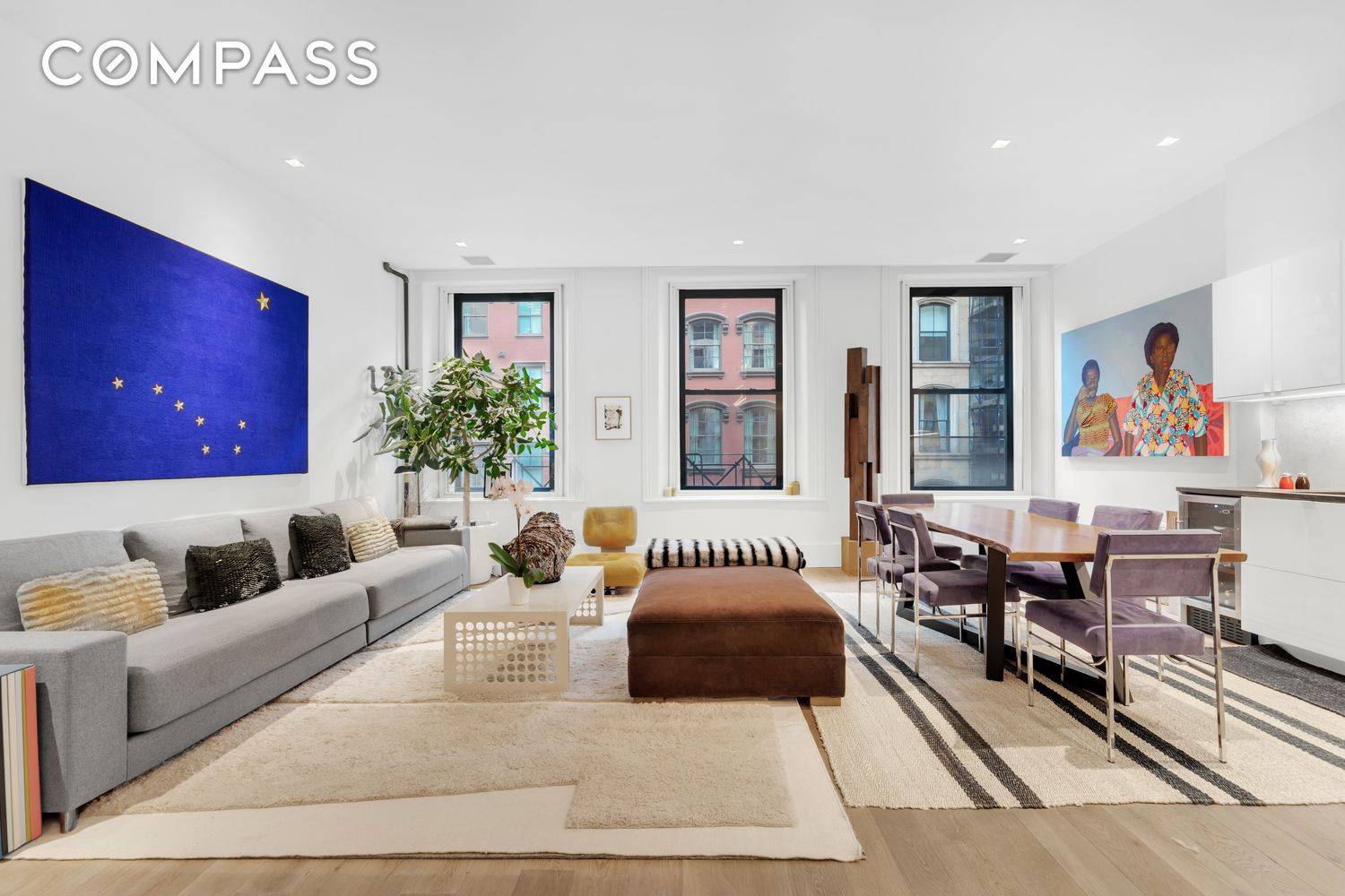 Contemporary finishes with sleek lines suffuse this gut renovated floor through co op in prime Tribeca, a walk up 1 bedroom, 2 bathroom home that exemplifies modern luxury living.