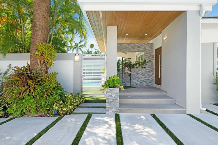 Welcome to 1616 S Bayshore Dr a beautifully maintained residence offering 4 bedrooms, 4.