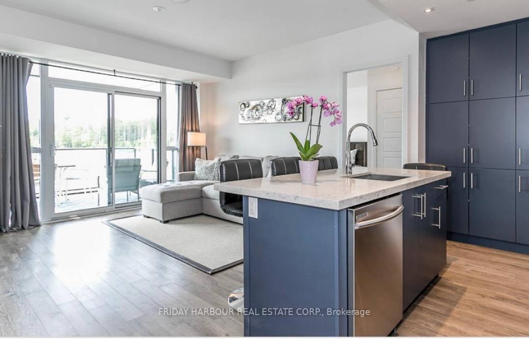 Discover refined lakeside living in this fully furnished 2 bedroom, 2 bathroom suite in the Aquarius building at Friday Harbour.