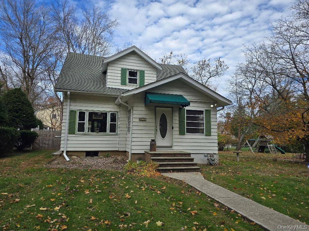 Your own single family house featuring three bedrooms plus a den 2 and a half bathrooms, Period Moldings, hardwood floors, enclosed porch, living room with pellet stove, full finish basement ...