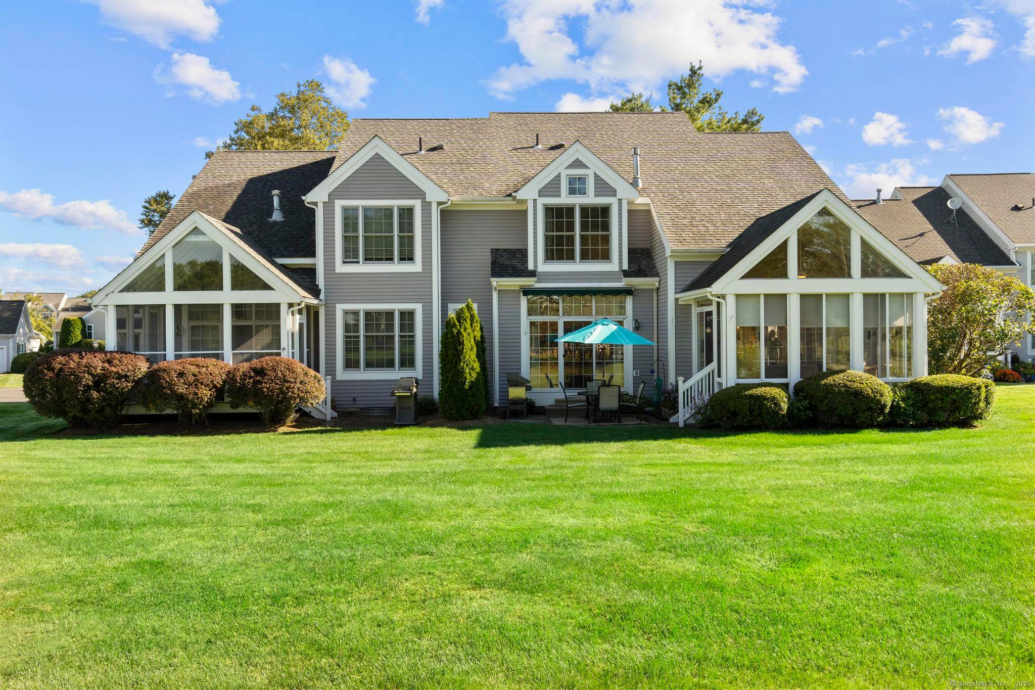 Imagine stepping right off your patio onto the 6th tee at the prestigious TPC River Highlands.