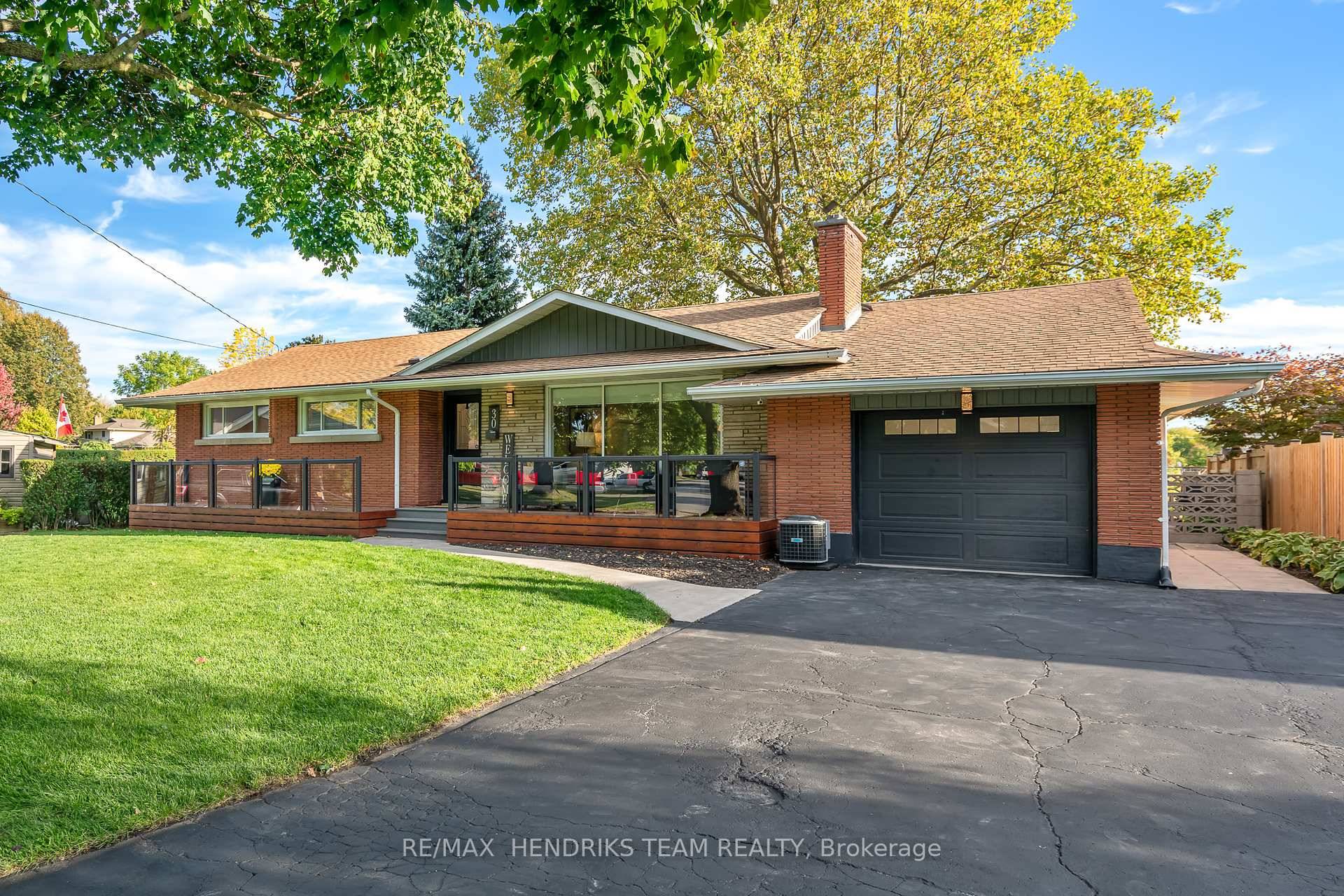 Welcome to this beautiful North End bungalow set on an approximate quarter acre lot located on a quiet street with fantastic curb appeal.