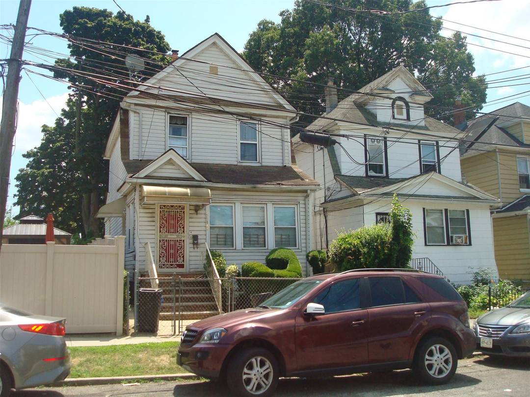 Legal two Fam in the heart of Jamaica two over one complete with paying Sec 8 tenants with expired lease.