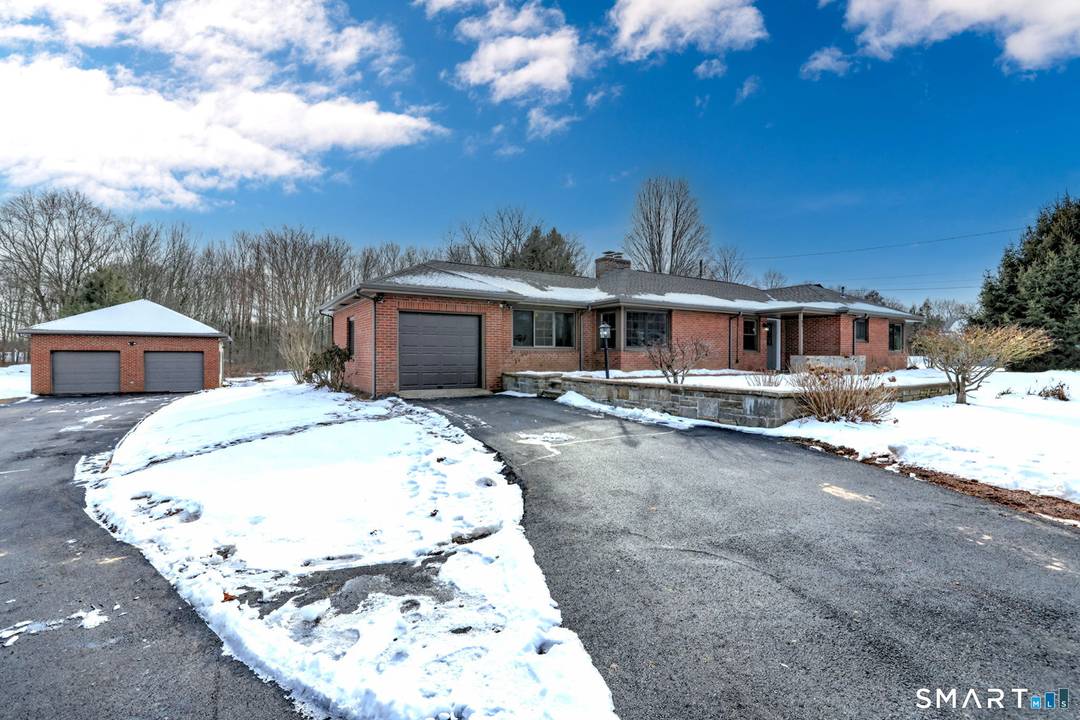 Welcome to 53 Geer Street in Cromwell an exquisite brick ranch that has been completely updated with refined finishes and thoughtful design throughout.