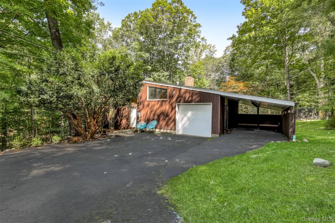 Beautifully redone contemporary home set back from road on a completely private.