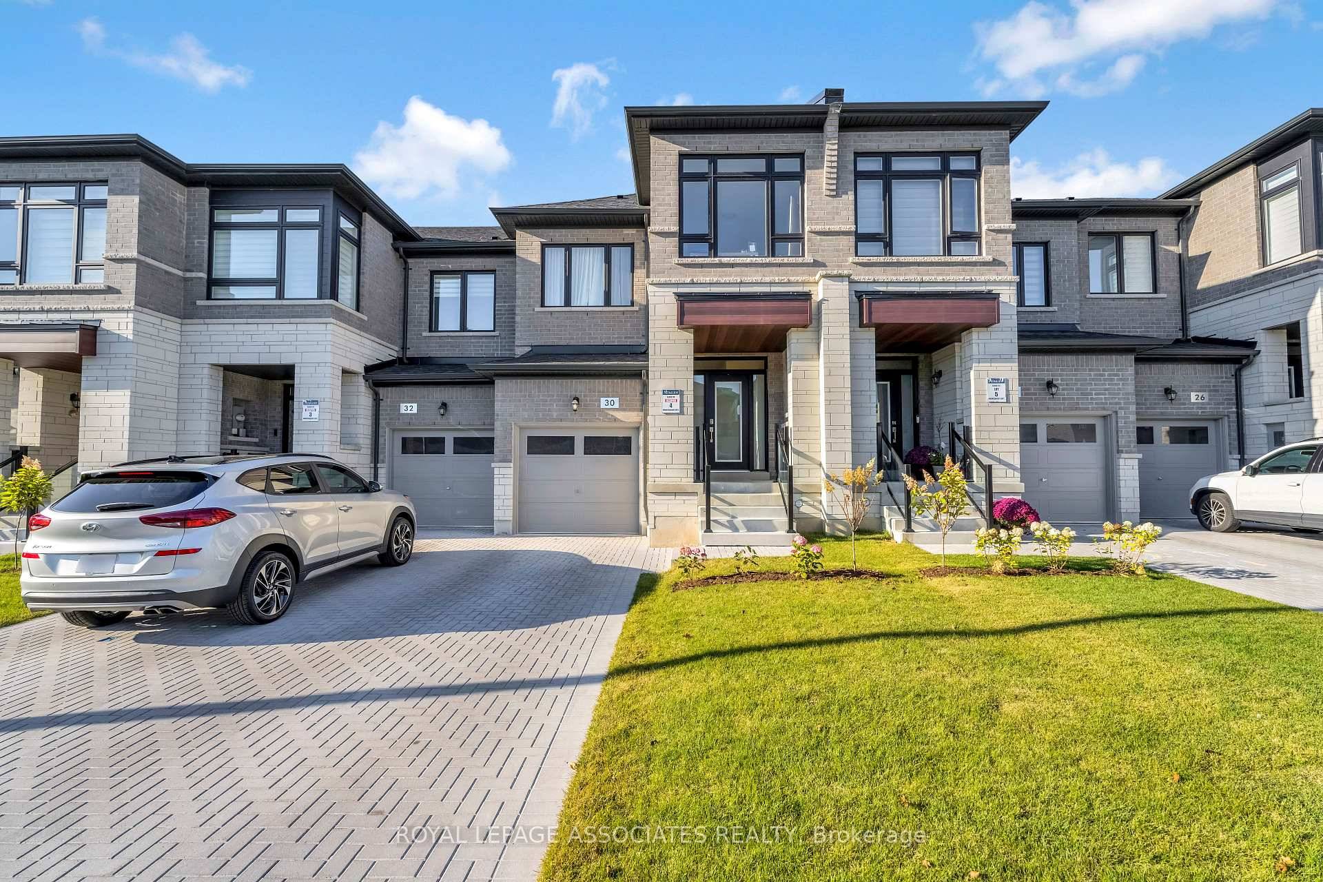 Welcome to this bright and spacious 4 bedroom, 3 bathroom townhome offering over 2, 500 sq ft of living space, including a finished basement.