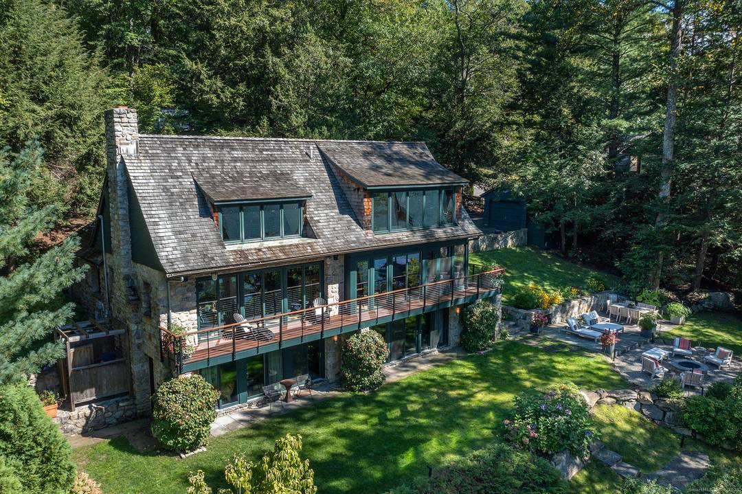Fabulous summer rental on Candlewood Lake showcases a fully renovated property with high end appointments, 4 BR, 4.