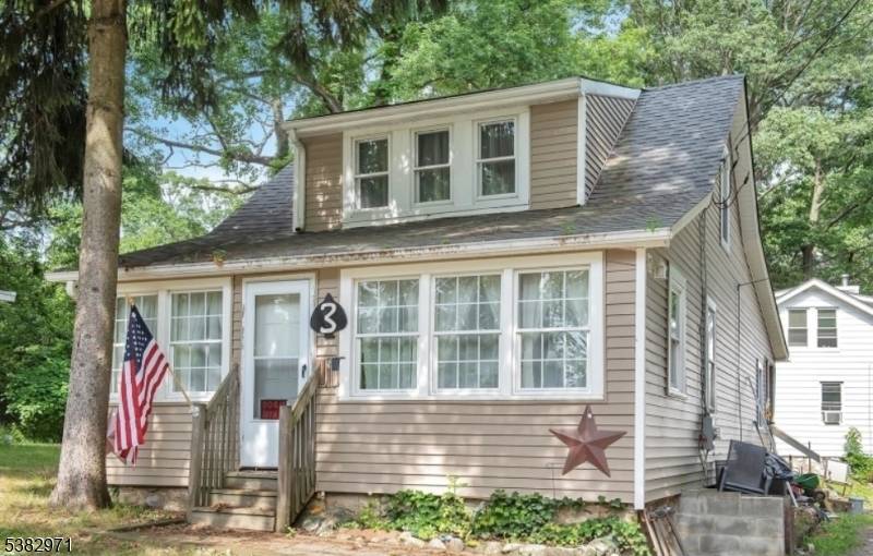 Welcome to this charming and peaceful Cape Cod home the first floor offers two generously sized bedrooms a spacious living room and a formal dining room perfect for entertaining.