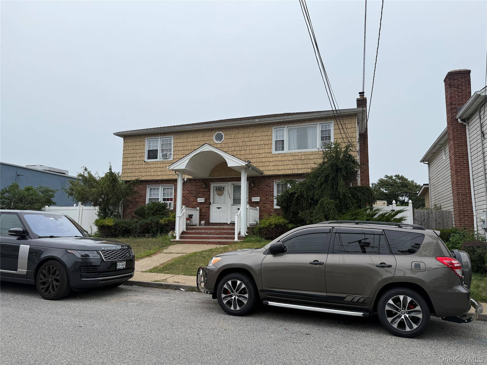 Exceptional Two Family Residence on Oversized 8, 000 Sq.