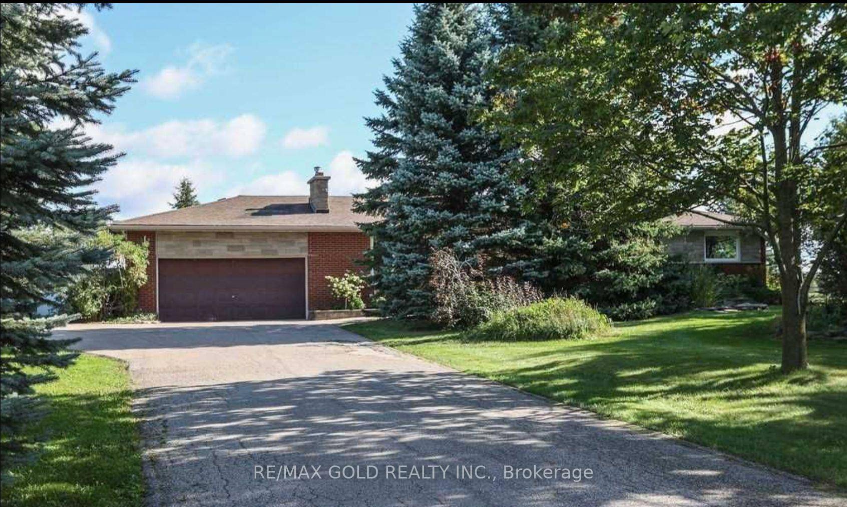 Beautiful Bungalow On a Large Acre Lot Located In the Beauty of Caledon Area.