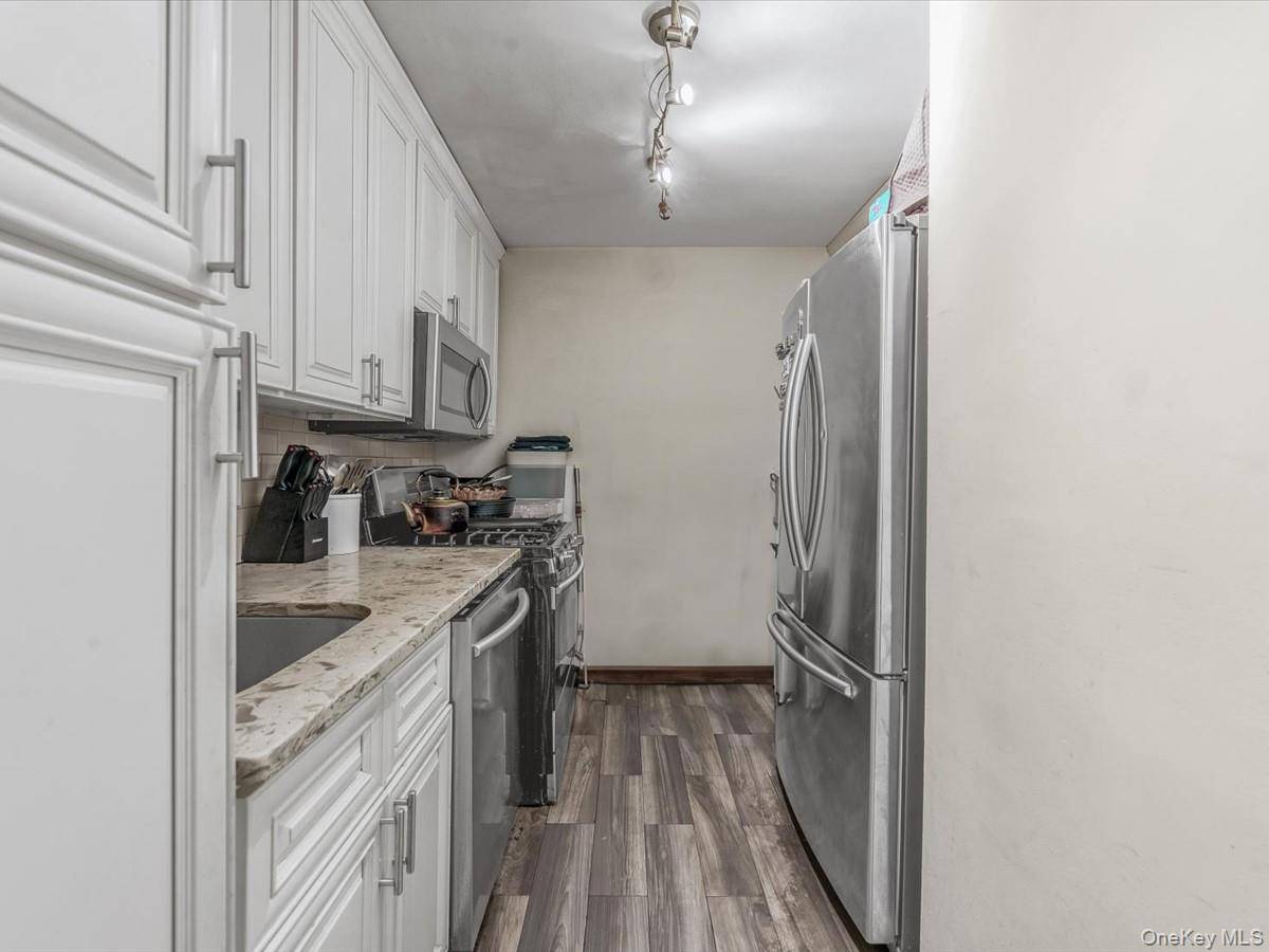 Welcome to Unit 6C at 94 31 59th Avenue a rarely available 3 bedroom, 2 bath co op offering an expansive layout and unbeatable convenience in the heart of Elmhurst.