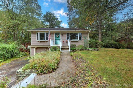 Overflowing with potential best describes this custom ranch with coveted private lake beach access in the heart of Monroe !