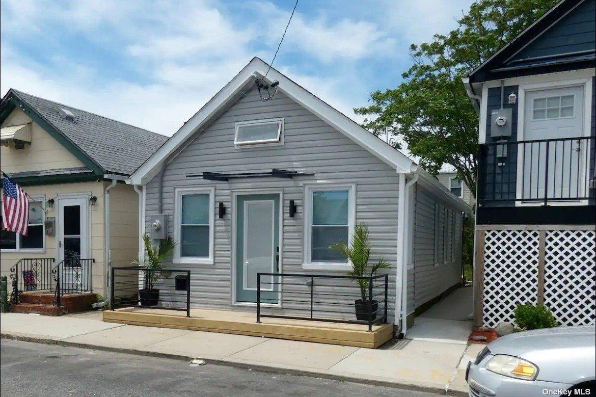 This Beautiful Bungalow was Recently Renovated and Features an Open Concept Living Area, Modern Bath, 2 Bedrooms and Sliders to the Deck w Access to a Landscaped Backyard w Large ...