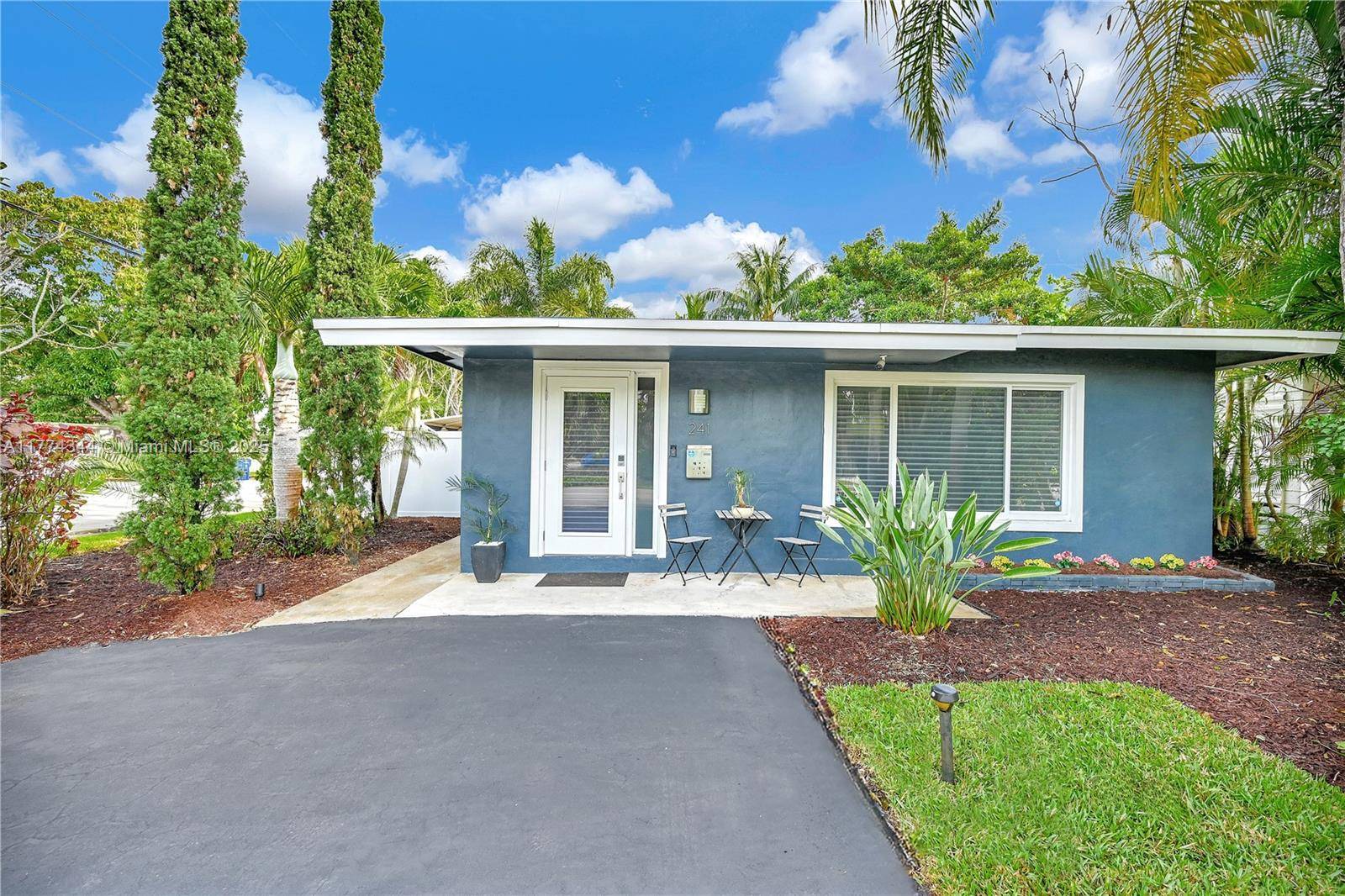Stylish and renovated, this open concept 2BR 2BA retreat in Wilton Manors sits on a corner lot.