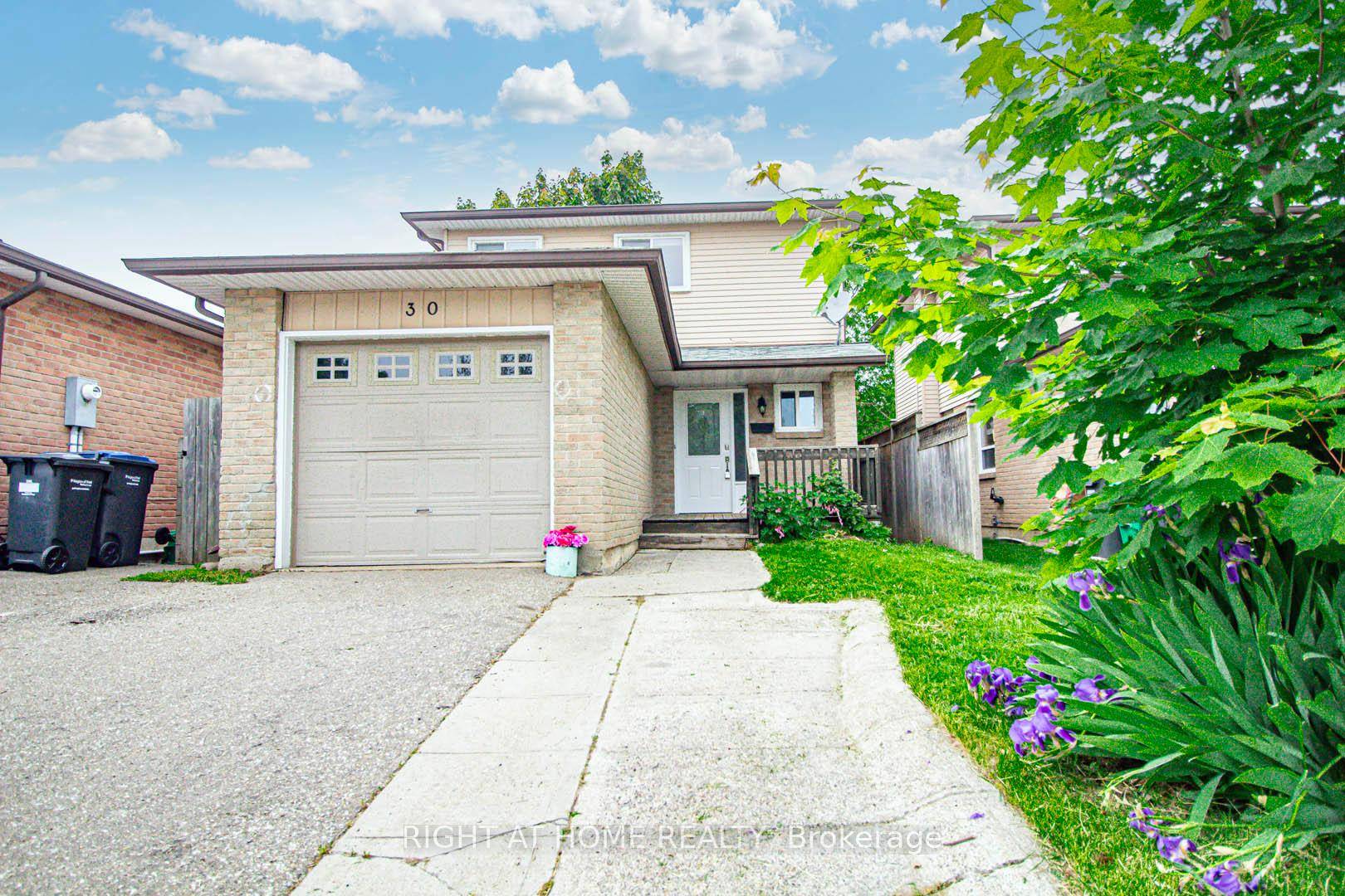 Gorgeous Gem ! Bright, open concept layout, freshly painted throughout !