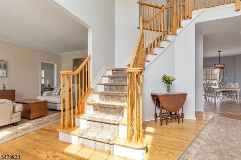 Custom built Colonial set on a large lot featuring 5 bedrooms and 3 full baths.