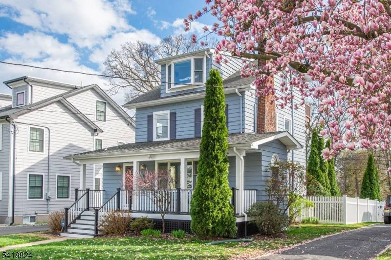 Set back from the tree lined side street with striking curb appeal.