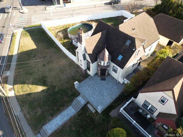 Welcome to this beautiful corner property, four bedroom, three bathroom mini mansion.