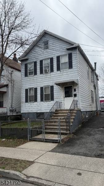 Great 2 family home with unlimited potential in a redeveloped neighborhood new homes new parks this is a stone away ; both units are generous in size 3 BR walk ...