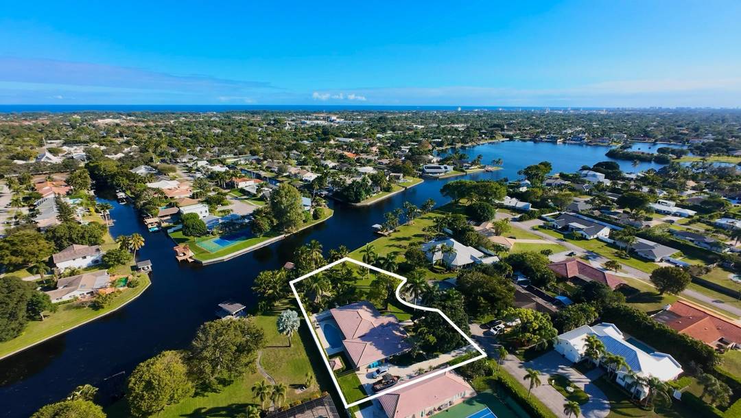 Tucked away on a rare, sprawling tropical lakefront estate, this luxury retreat offers the best of both worlds complete privacy and serenity just 2 miles from vibrant downtown Delray and ...