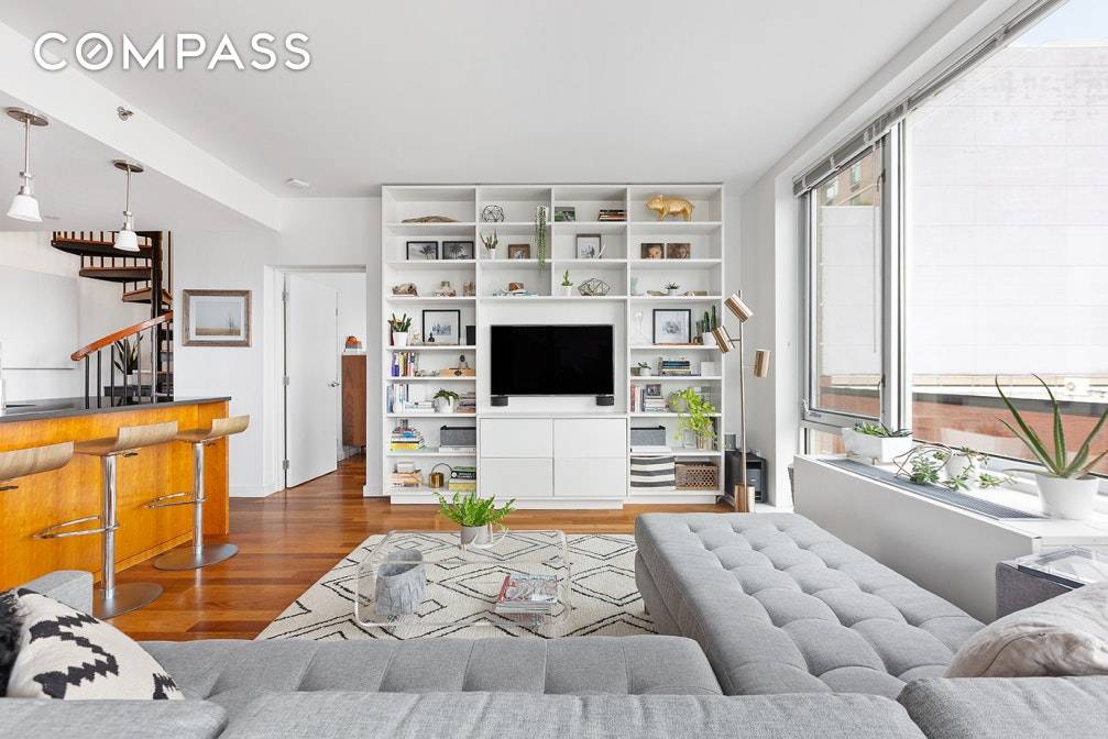 This spacious, beautifully maintained 3 Bedroom, 2 Bath duplex home with a private rooftop terrace is available at The Foundry at Hunters Point, a boutique condo building on a tree ...
