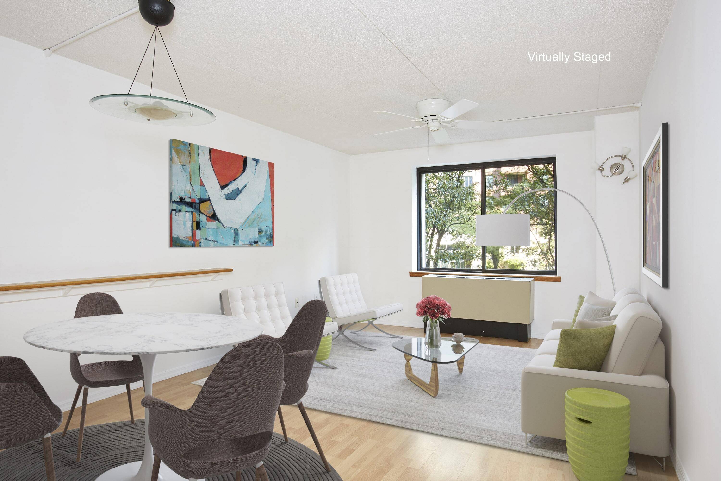 Walking in to 2I, you'll notice the calming northern park views, renovated flooring, plus custom bookshelves and desk.
