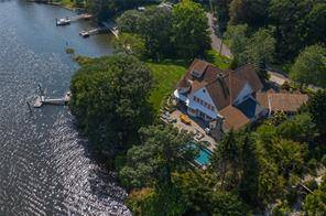 5 Stony Point Road is situated on a sweeping acre along the waterfront of the Saugatuck River facing South towards Long Island Sound.